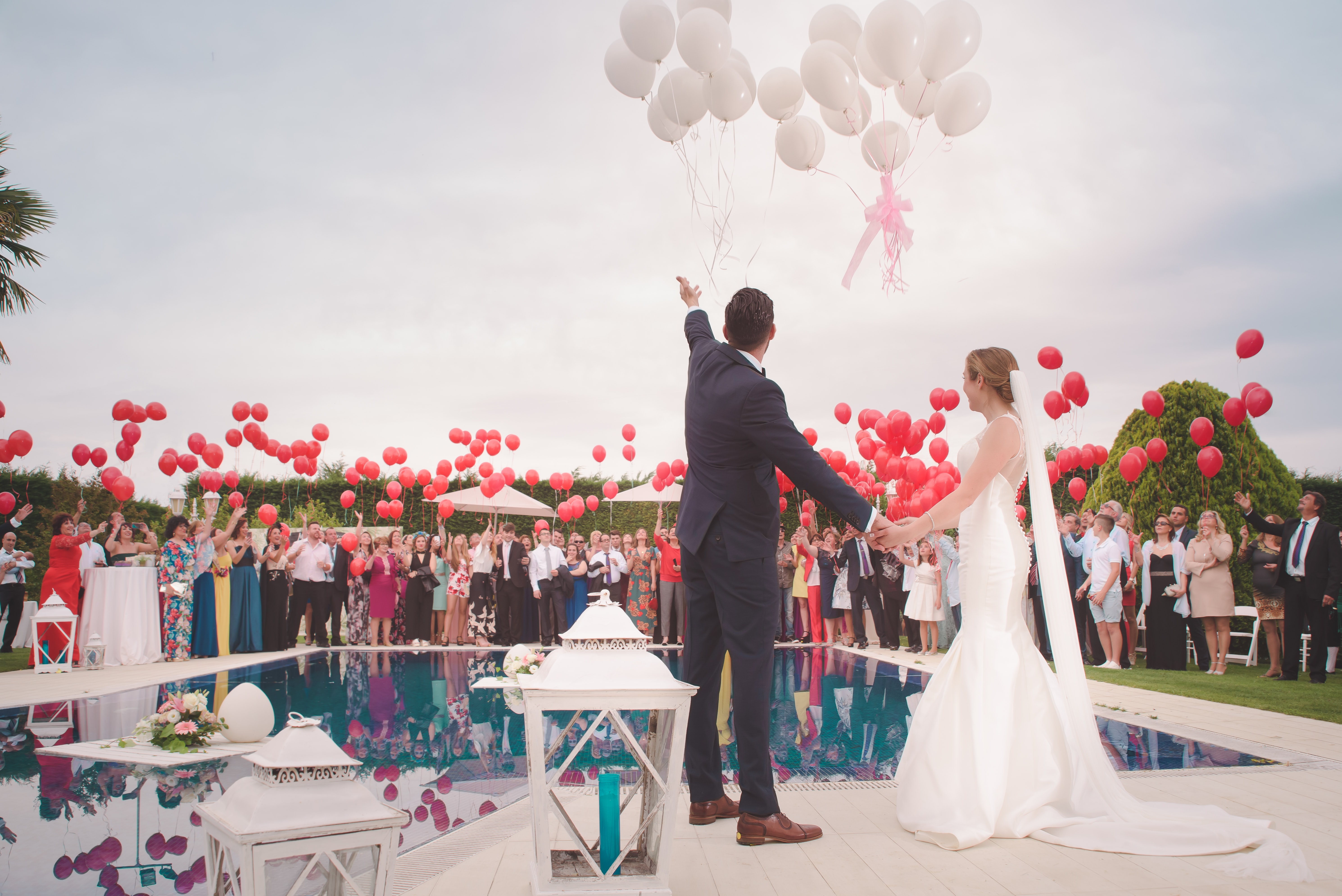 Wedding couple beside pool